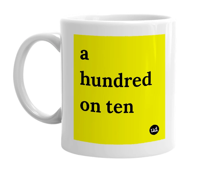 White mug with 'a hundred on ten' in bold black letters