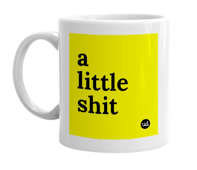 White mug with 'a little shit' in bold black letters