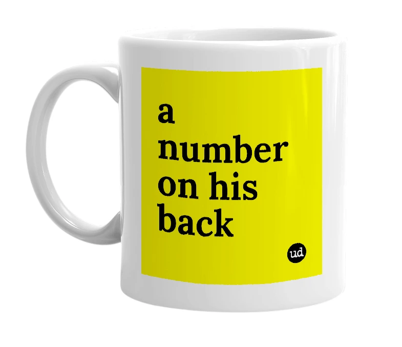 White mug with 'a number on his back' in bold black letters