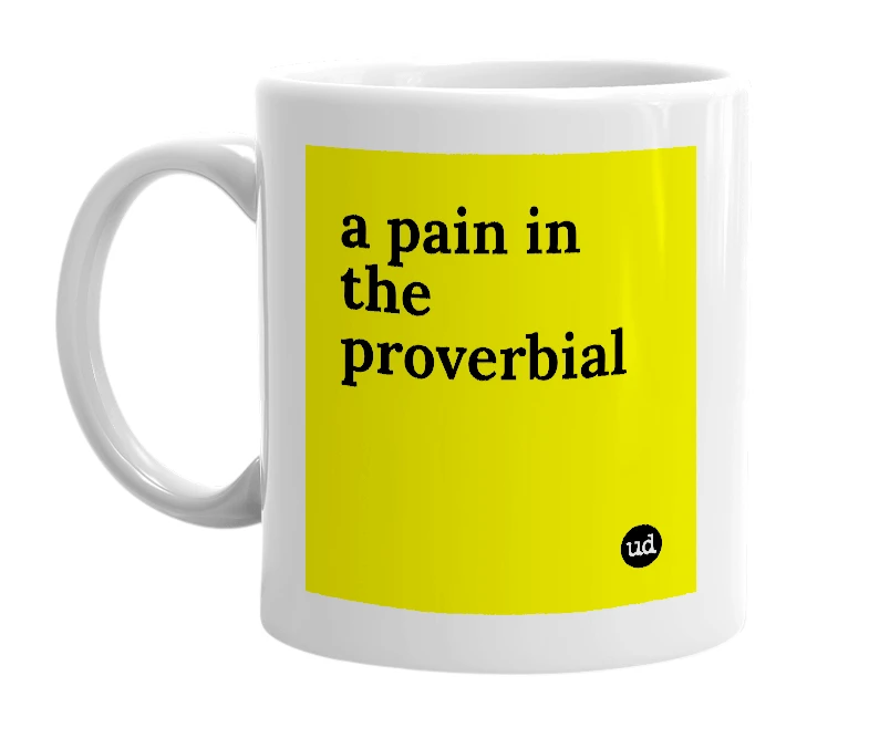 White mug with 'a pain in the proverbial' in bold black letters