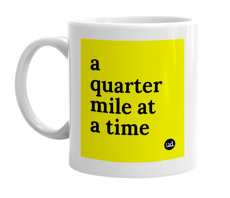 White mug with 'a quarter mile at a time' in bold black letters