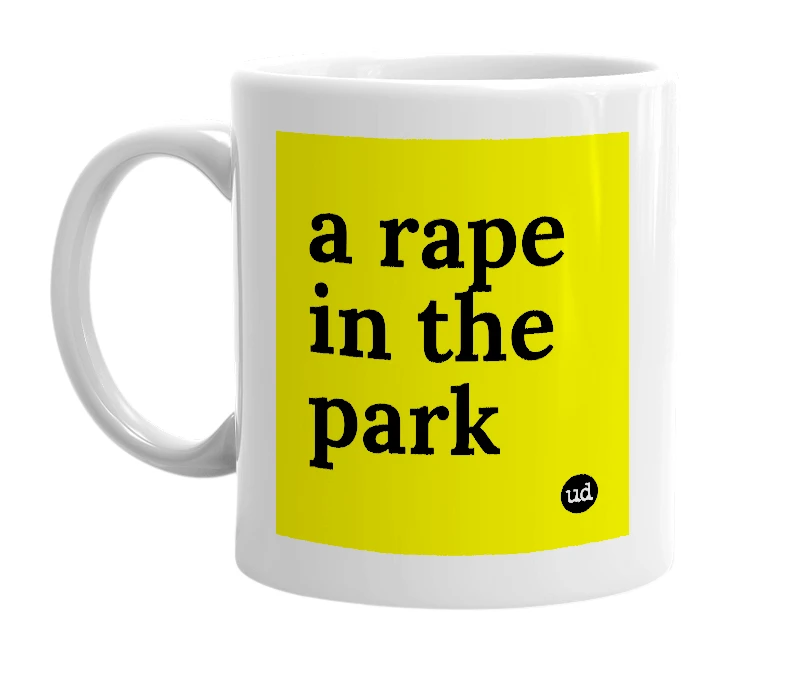 White mug with 'a rape in the park' in bold black letters