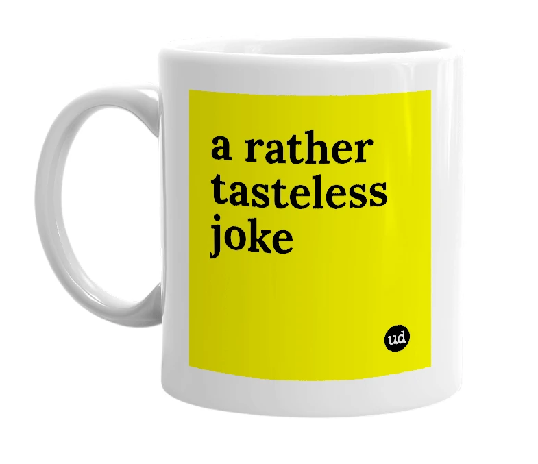White mug with 'a rather tasteless joke' in bold black letters