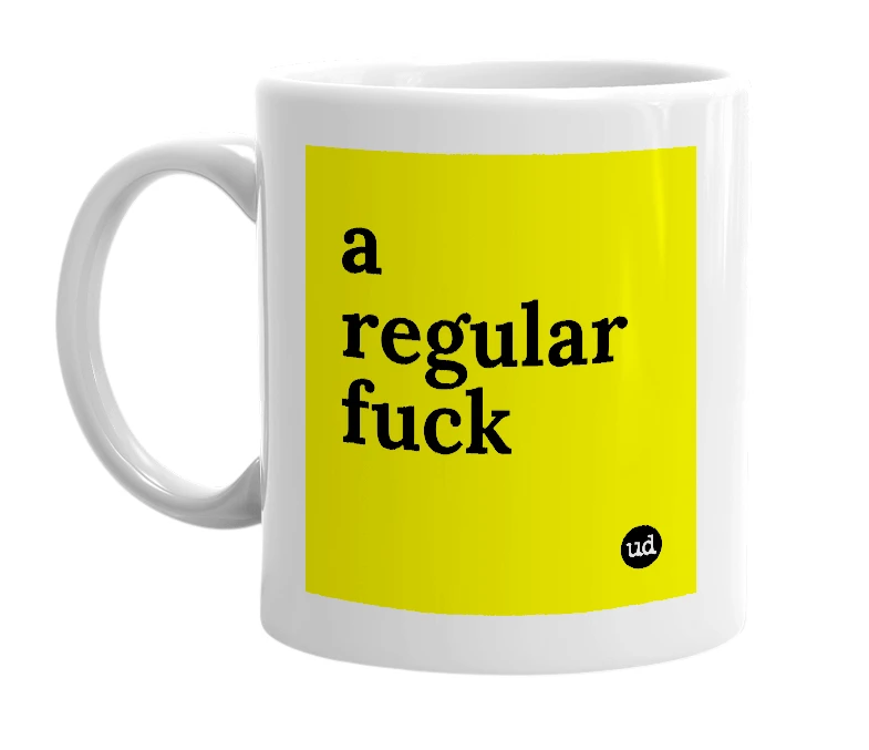 White mug with 'a regular fuck' in bold black letters