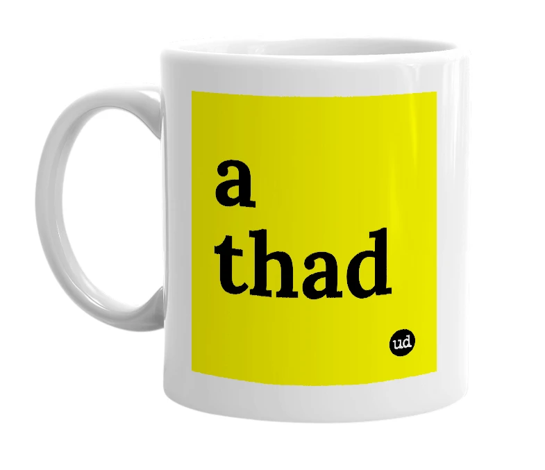 White mug with 'a thad' in bold black letters