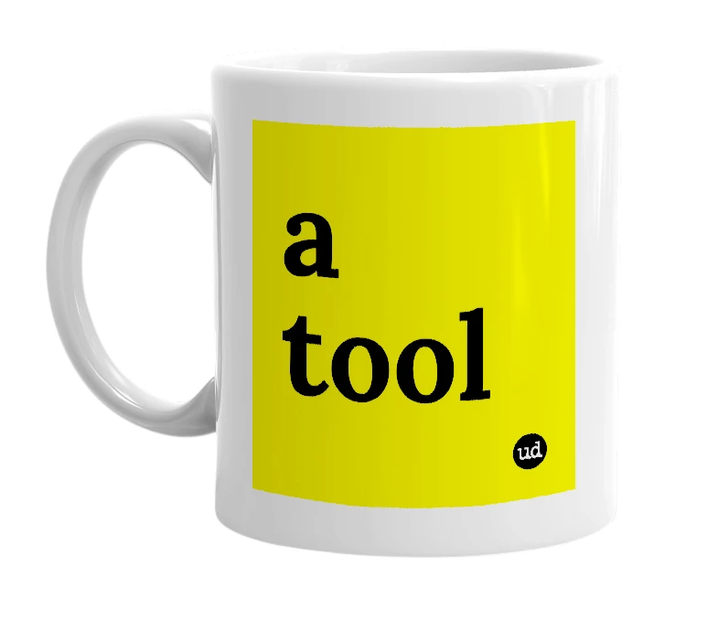 White mug with 'a tool' in bold black letters