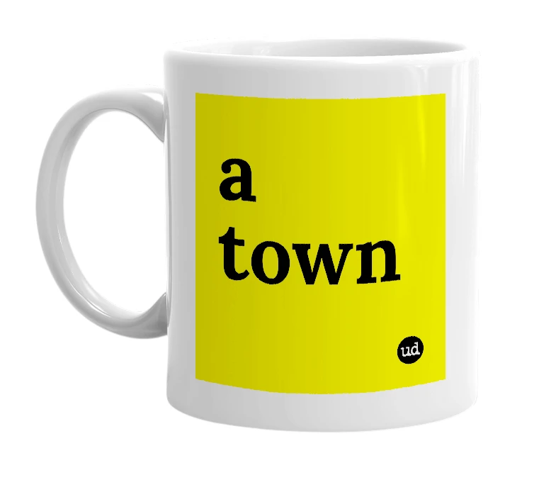 White mug with 'a town' in bold black letters