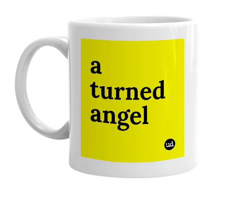 White mug with 'a turned angel' in bold black letters