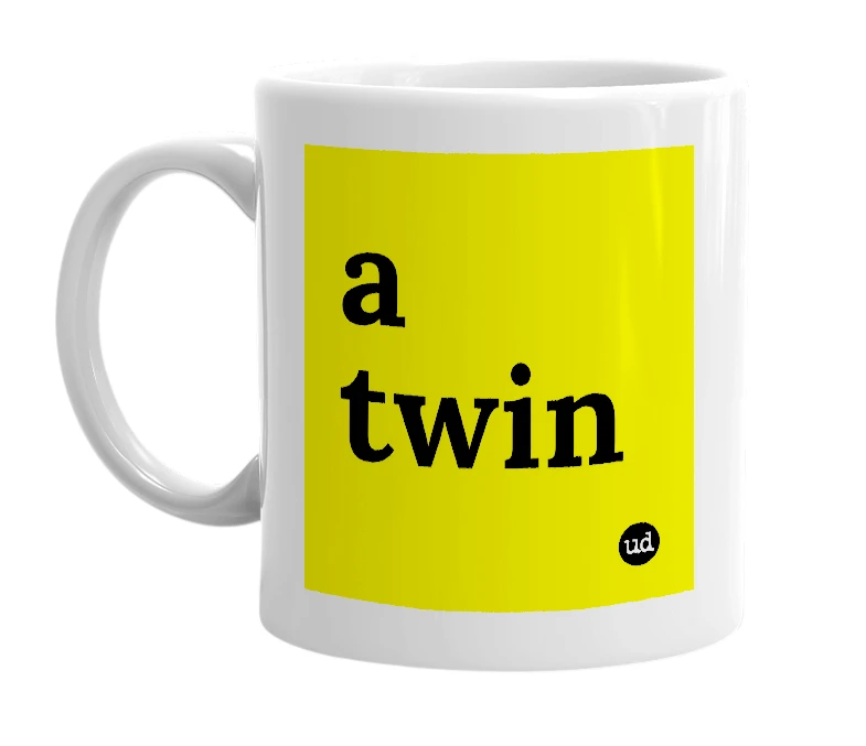 White mug with 'a twin' in bold black letters