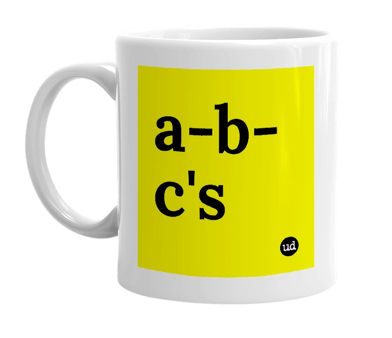 White mug with 'a-b-c's' in bold black letters