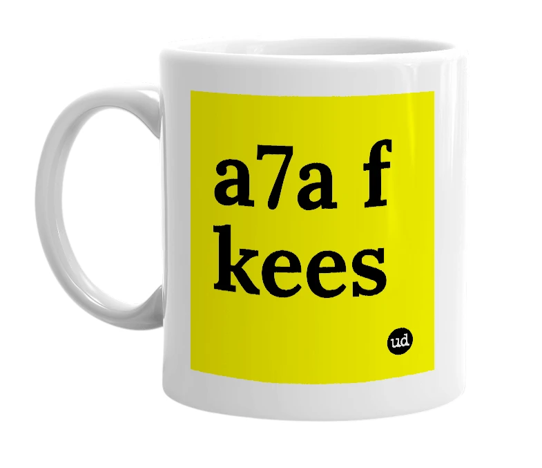 White mug with 'a7a f kees' in bold black letters