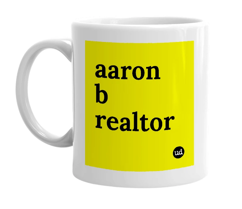 White mug with 'aaron b realtor' in bold black letters