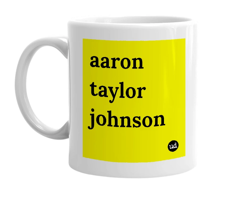 White mug with 'aaron taylor johnson' in bold black letters