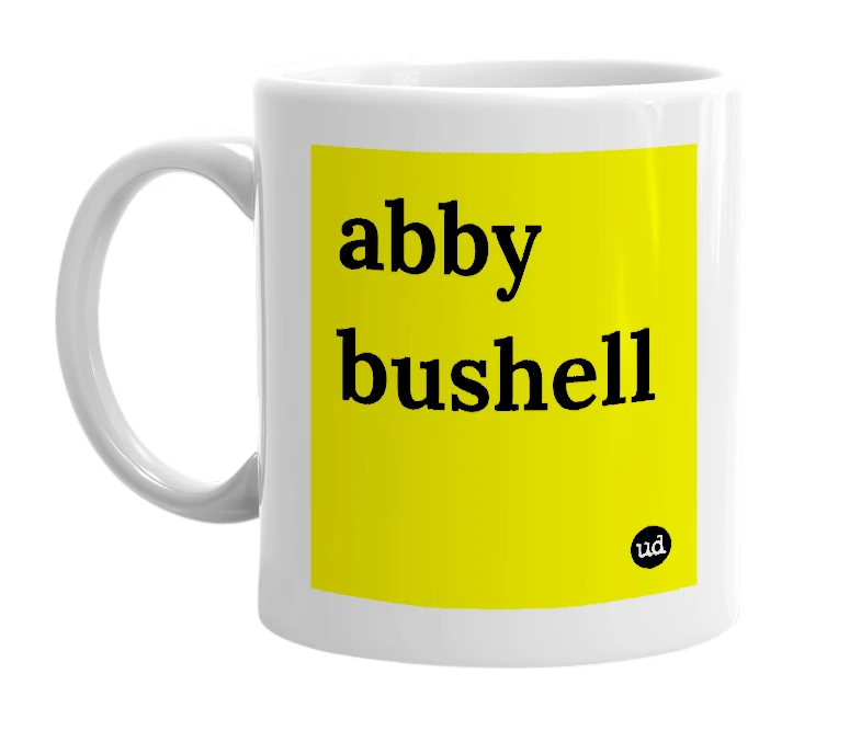 White mug with 'abby bushell' in bold black letters