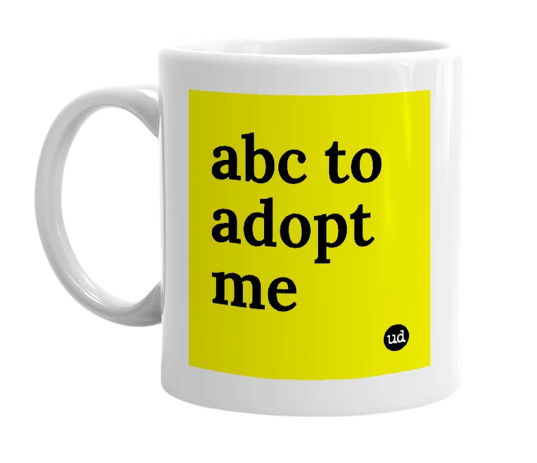 White mug with 'abc to adopt me' in bold black letters
