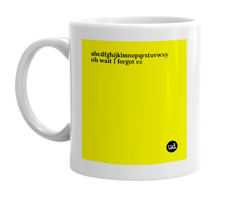 White mug with 'abcdfghijklmnopqrstuvwxy oh wait I forgot ez' in bold black letters