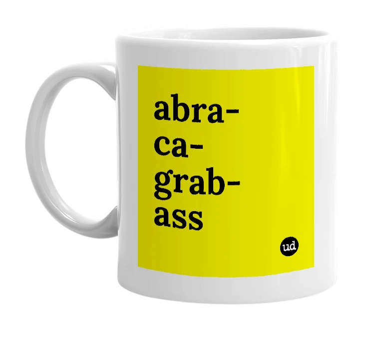 White mug with 'abra-ca-grab-ass' in bold black letters