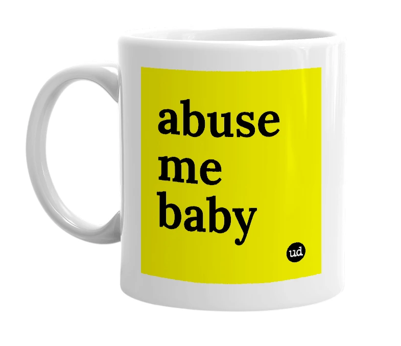 White mug with 'abuse me baby' in bold black letters