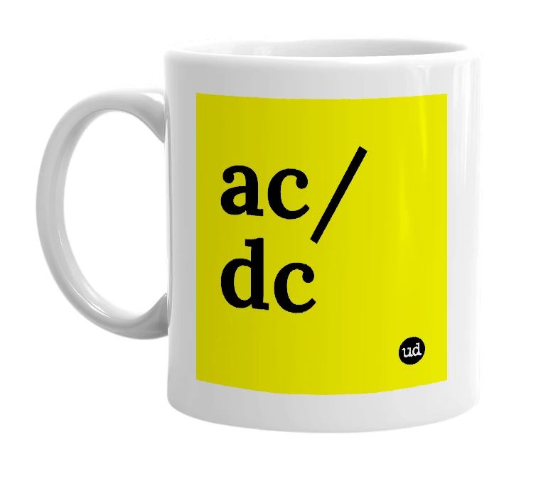 White mug with 'ac/dc' in bold black letters