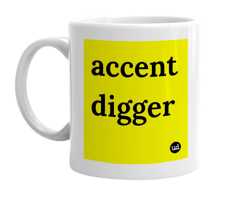 White mug with 'accent digger' in bold black letters