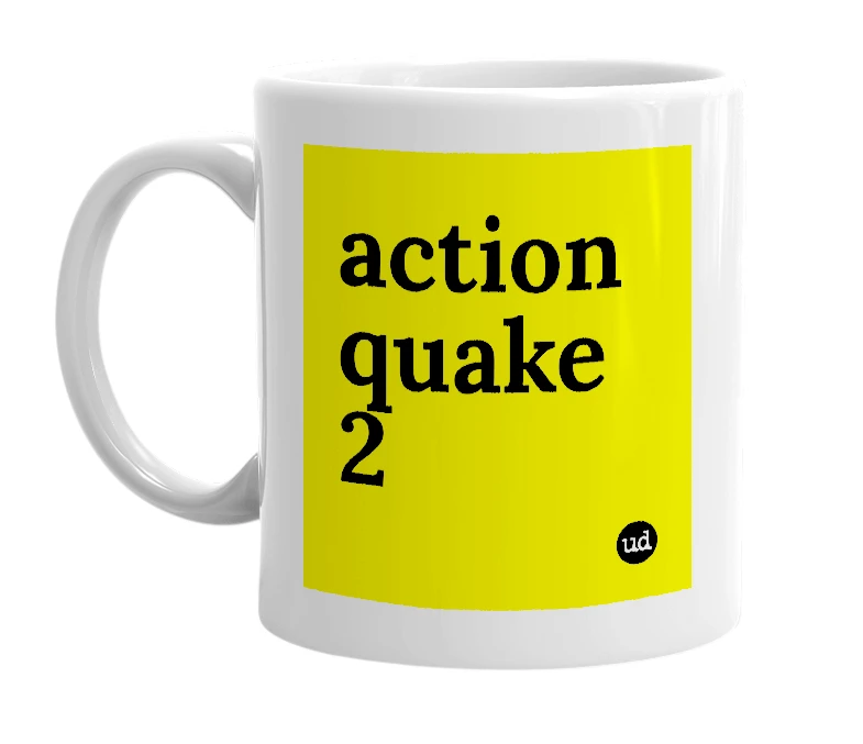 White mug with 'action quake 2' in bold black letters