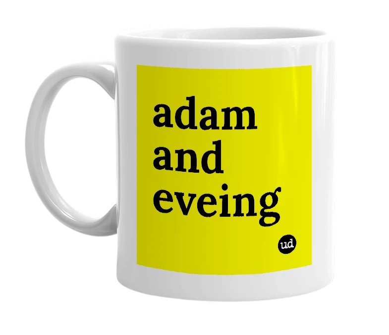 White mug with 'adam and eveing' in bold black letters