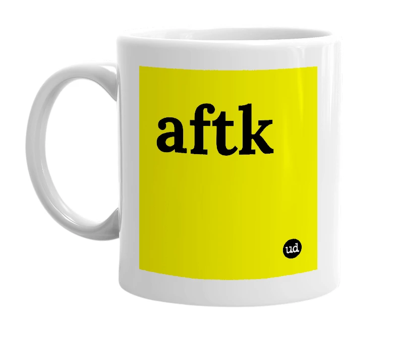 White mug with 'aftk' in bold black letters