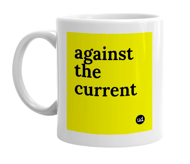 White mug with 'against the current' in bold black letters