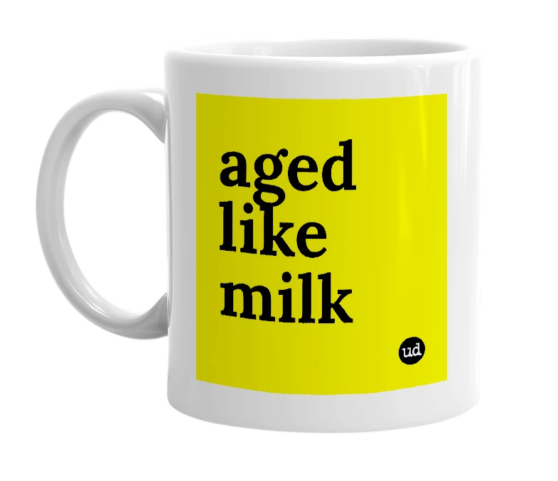 White mug with 'aged like milk' in bold black letters