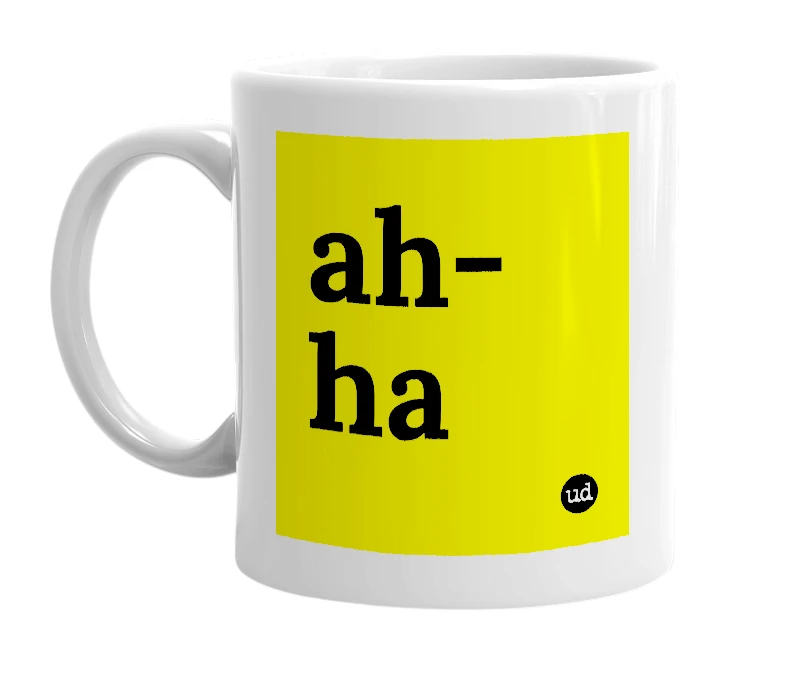 White mug with 'ah-ha' in bold black letters