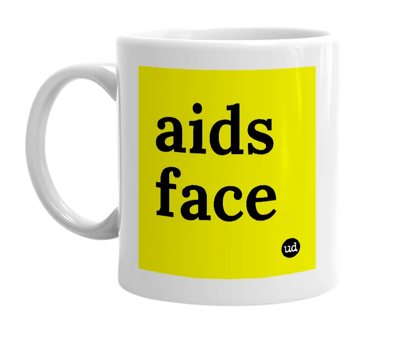 White mug with 'aids face' in bold black letters