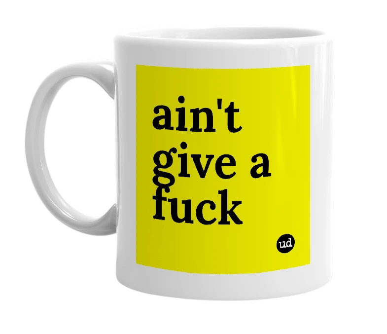 White mug with 'ain't give a fuck' in bold black letters