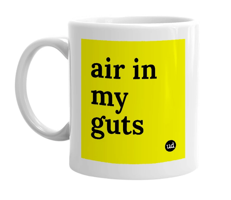 White mug with 'air in my guts' in bold black letters