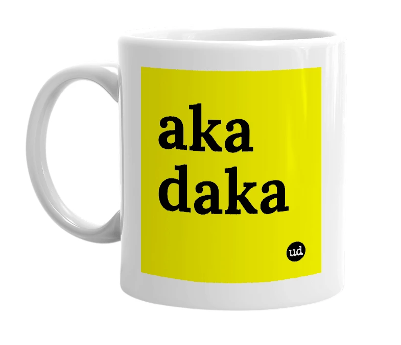 White mug with 'aka daka' in bold black letters