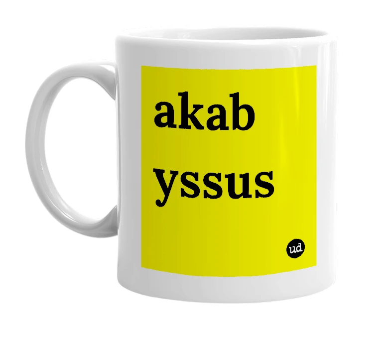 White mug with 'akab yssus' in bold black letters