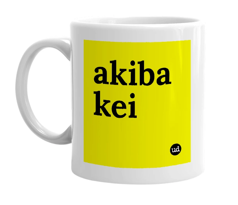 White mug with 'akiba kei' in bold black letters