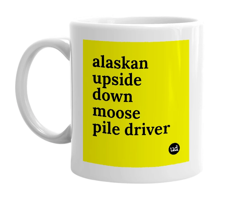 White mug with 'alaskan upside down moose pile driver' in bold black letters