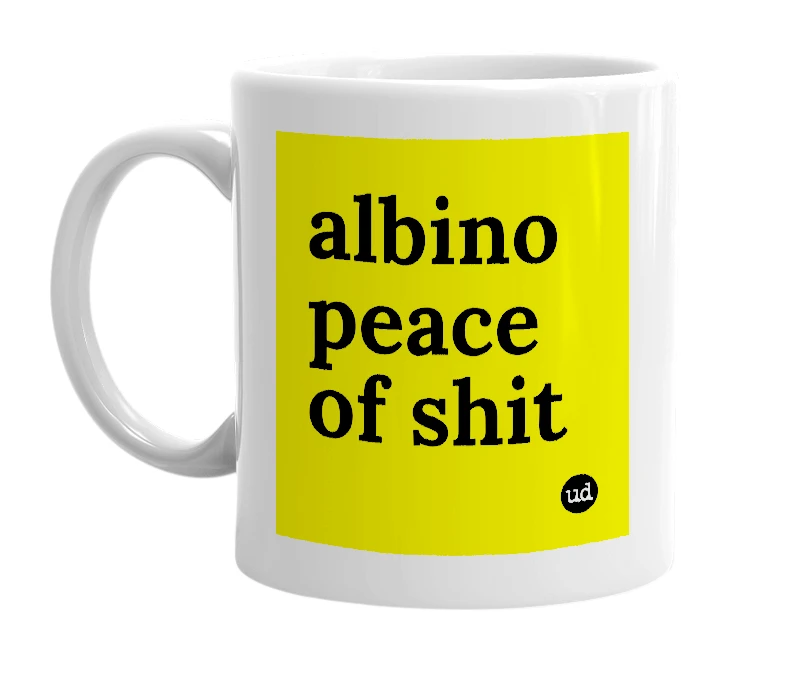 White mug with 'albino peace of shit' in bold black letters