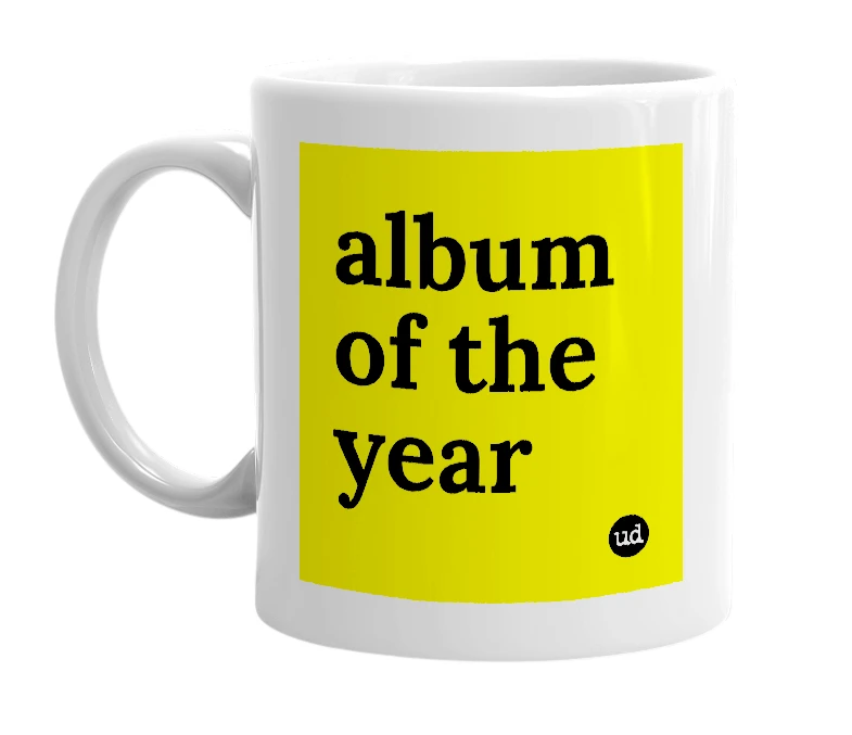 White mug with 'album of the year' in bold black letters