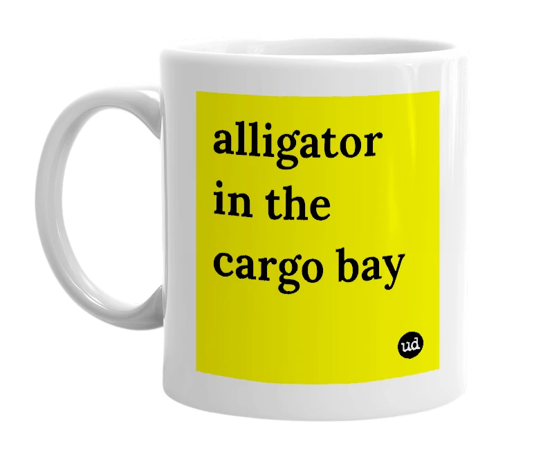White mug with 'alligator in the cargo bay' in bold black letters