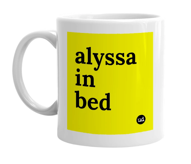 White mug with 'alyssa in bed' in bold black letters