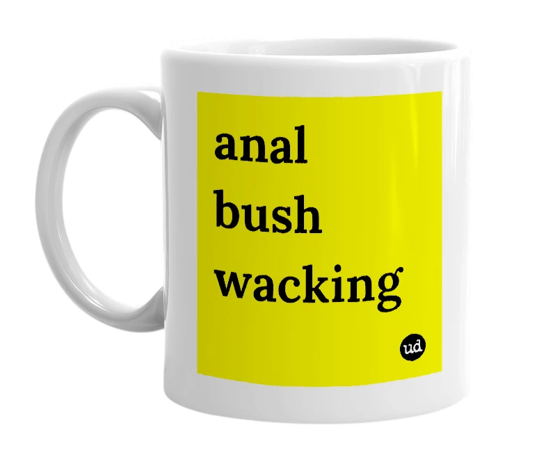 White mug with 'anal bush wacking' in bold black letters