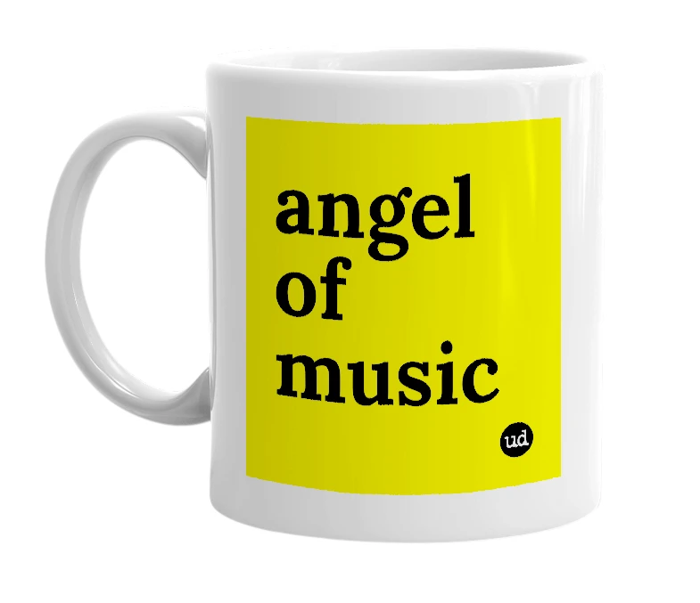 White mug with 'angel of music' in bold black letters