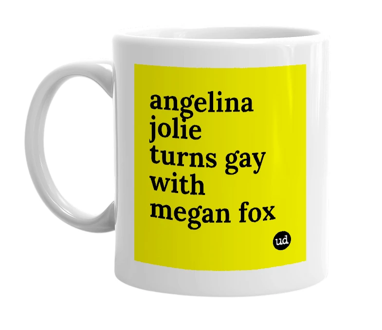 White mug with 'angelina jolie turns gay with megan fox' in bold black letters