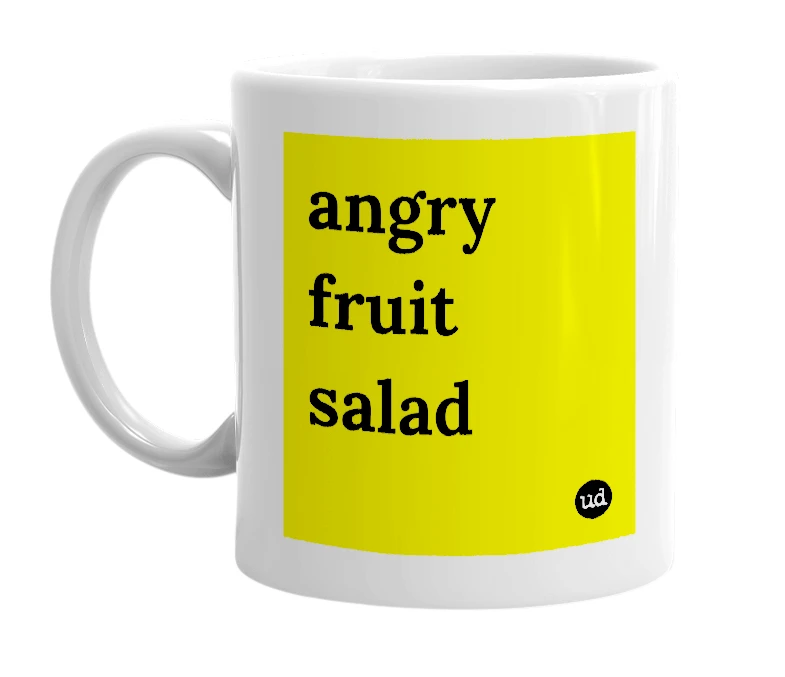 White mug with 'angry fruit salad' in bold black letters