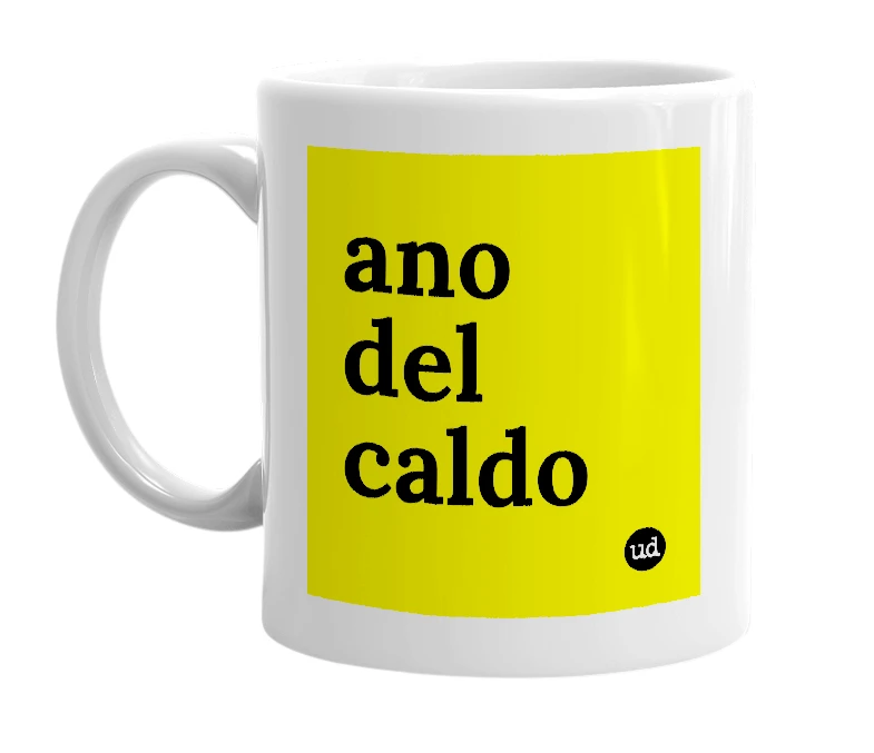 White mug with 'ano del caldo' in bold black letters