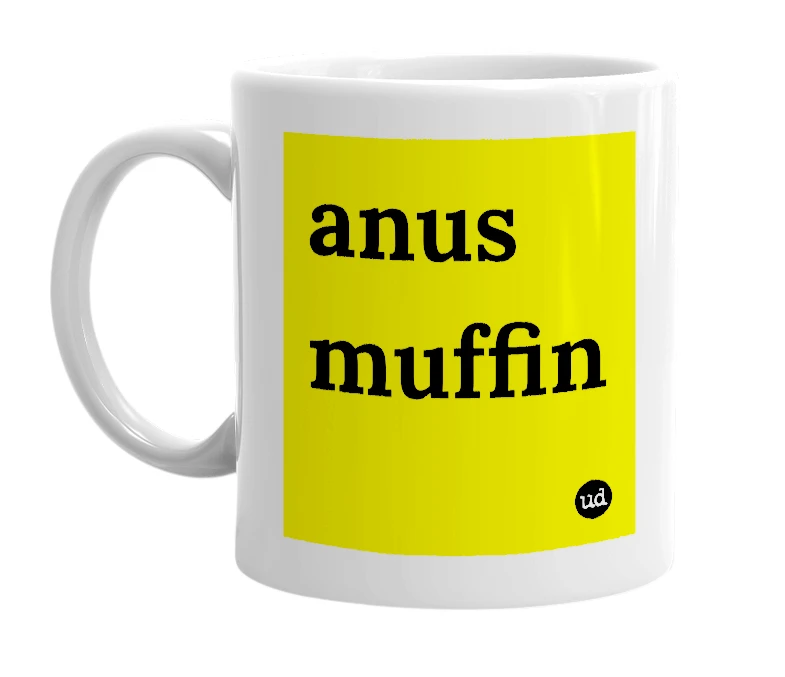 White mug with 'anus muffin' in bold black letters