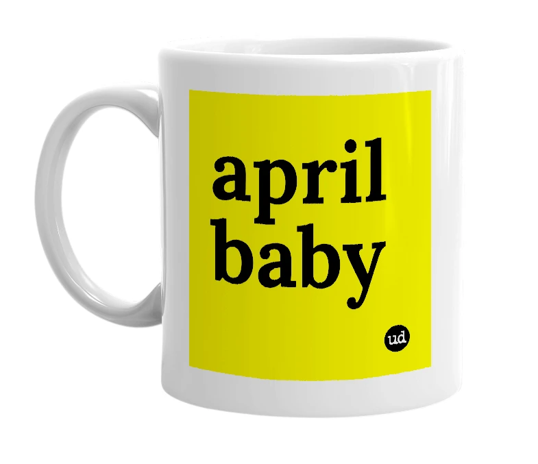 White mug with 'april baby' in bold black letters