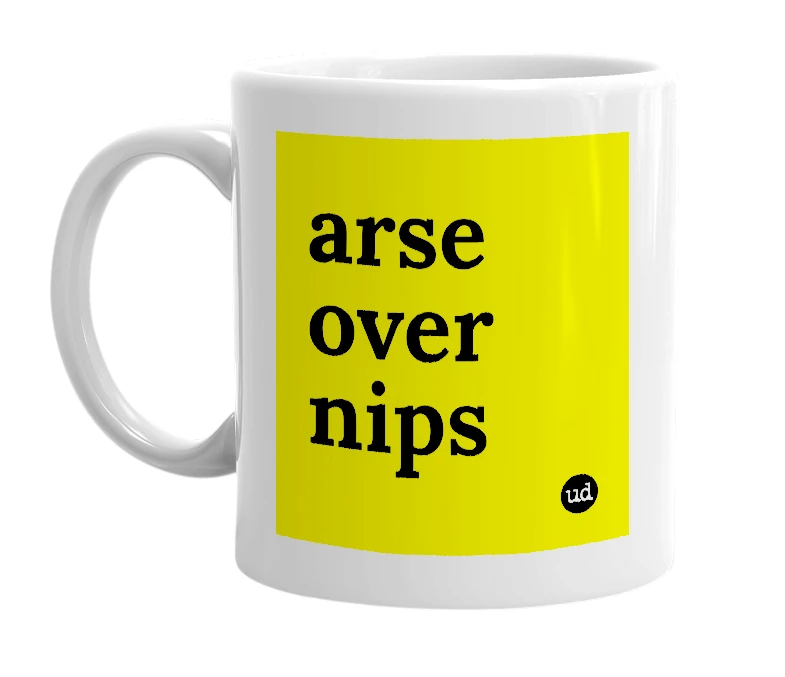 White mug with 'arse over nips' in bold black letters