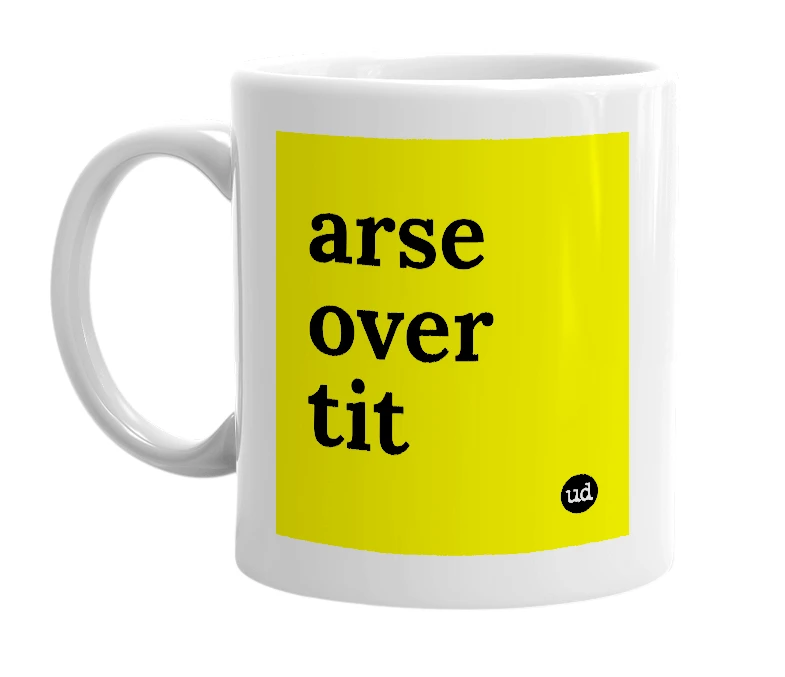 White mug with 'arse over tit' in bold black letters